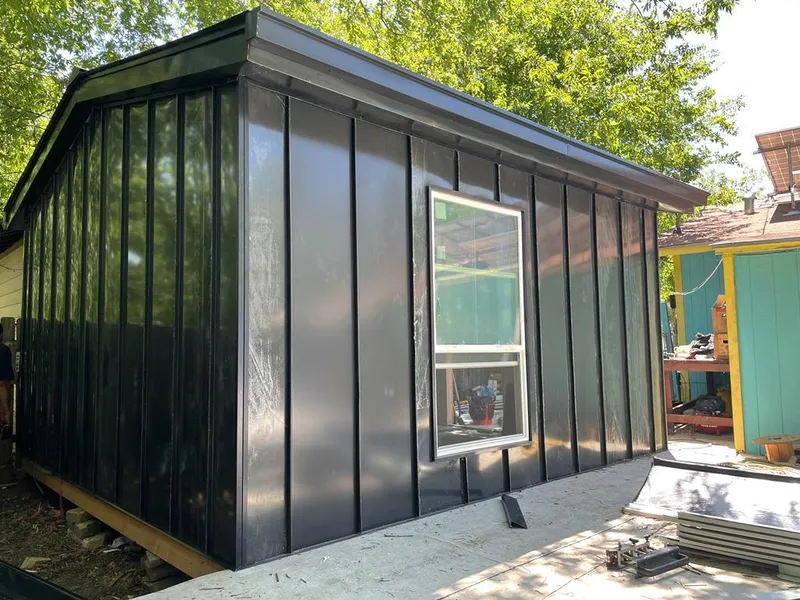 Black standing seam metal wall panels for Roof Inspection in San Angelo
