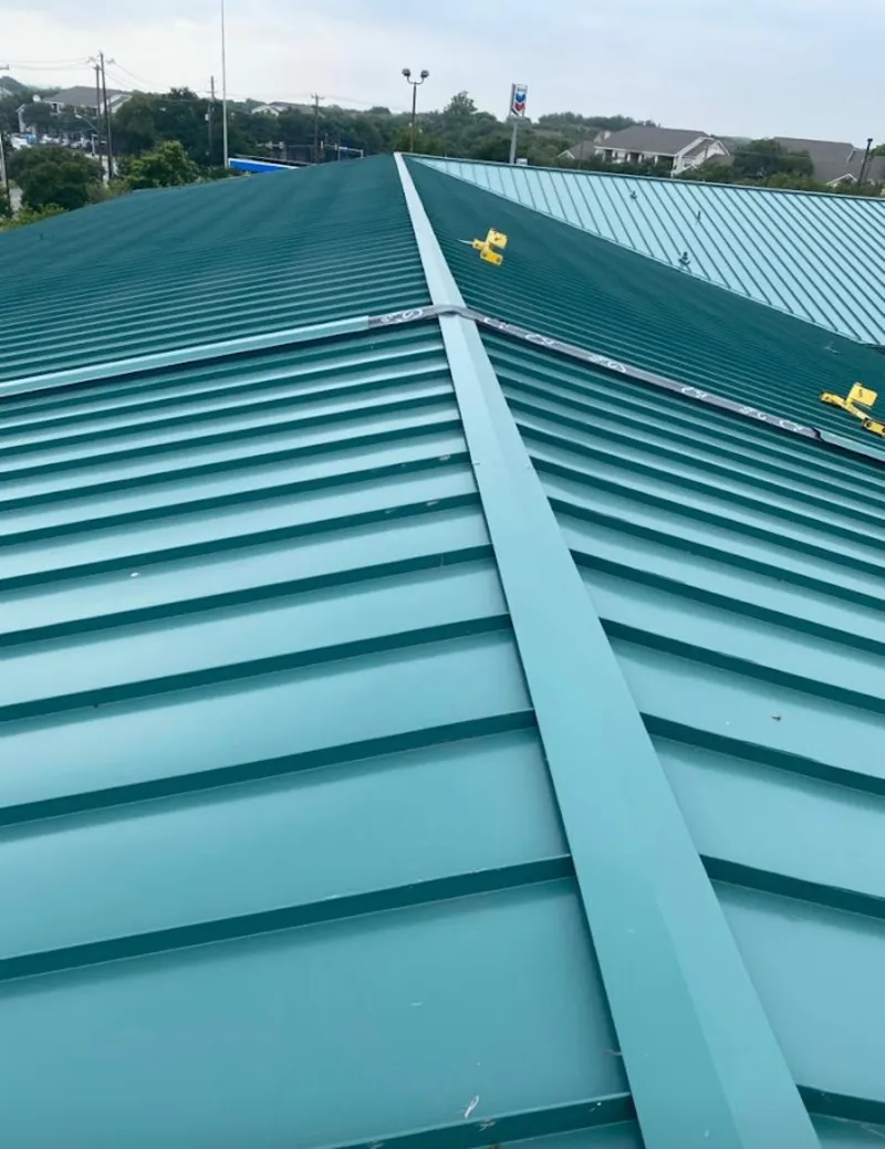 Green commercial metal roof ridge and valley for Metal Roof Repair in San Angelo