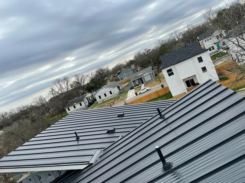 Standing seam metal roof panels with vents for Skylight Repair in San Angelo